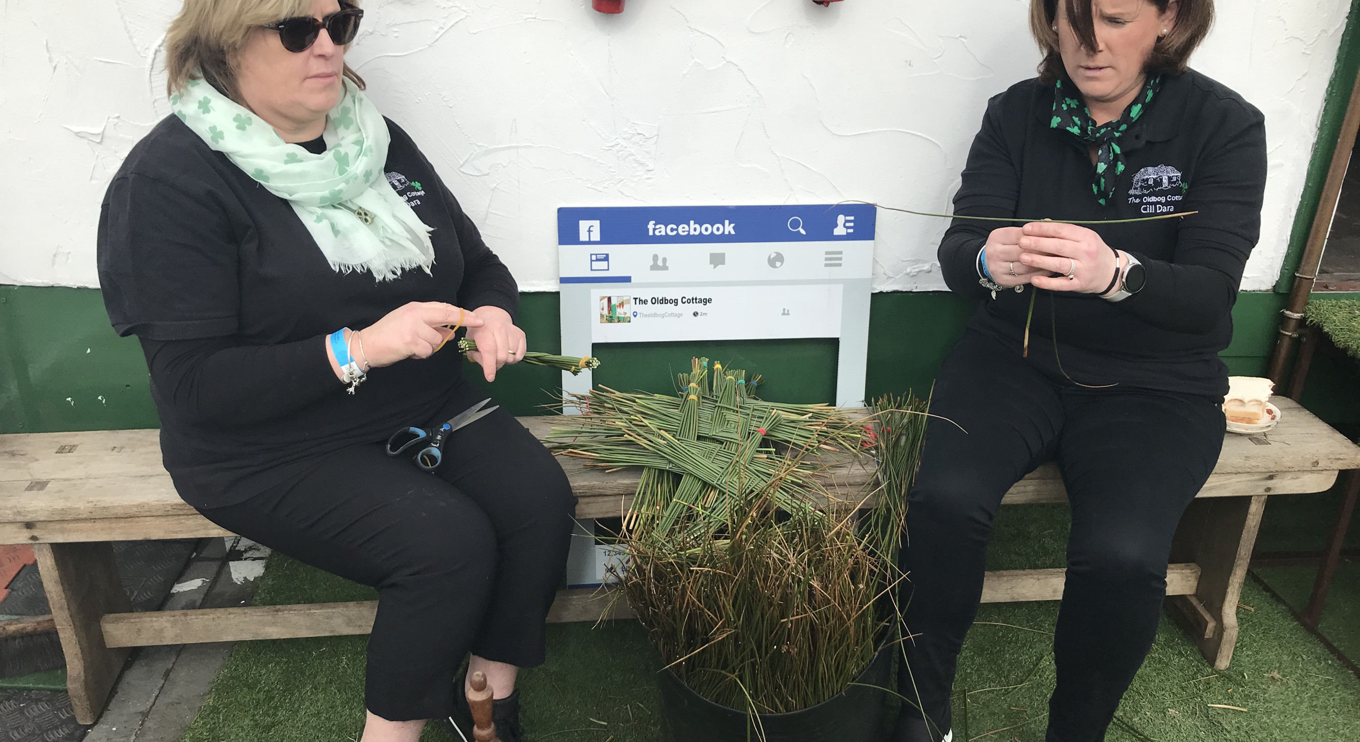 Making St Brigid's crosses outside the Old Bog Cottage