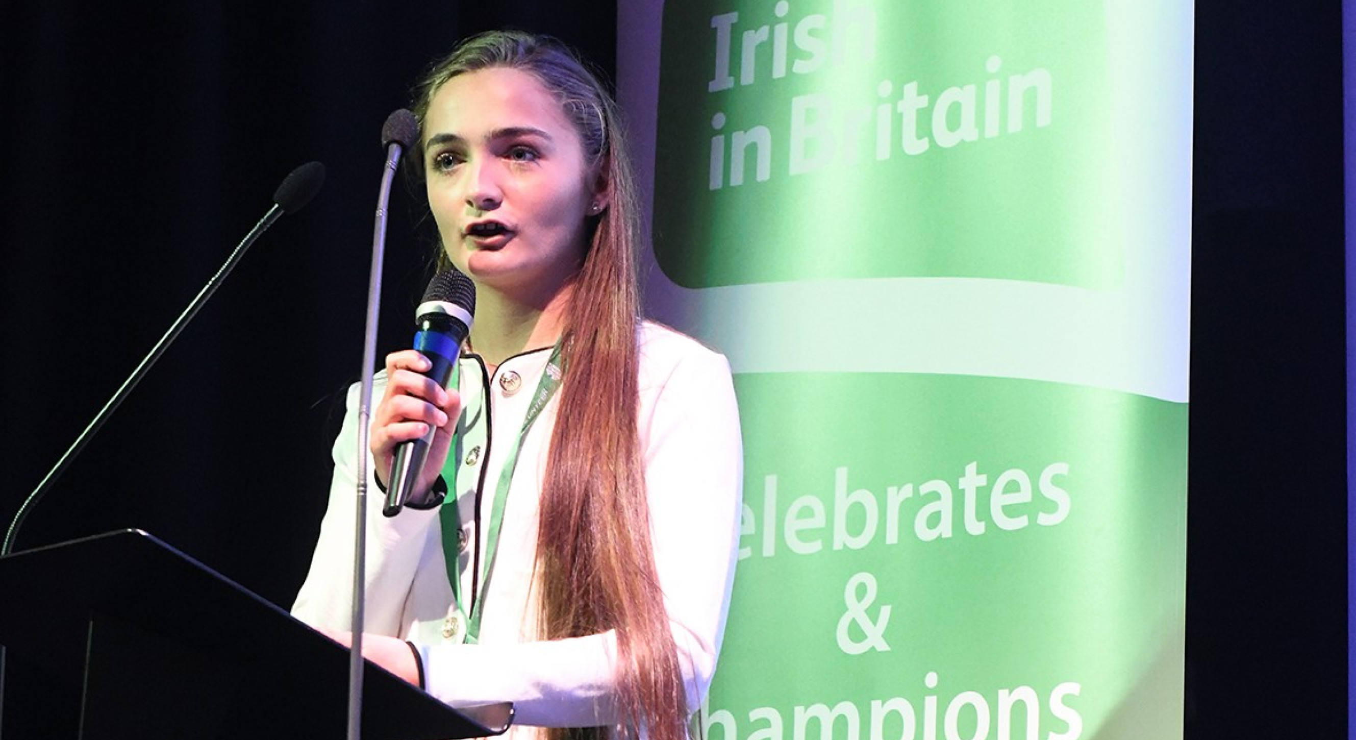 Alanna Witney accepts Young Volunteer Award