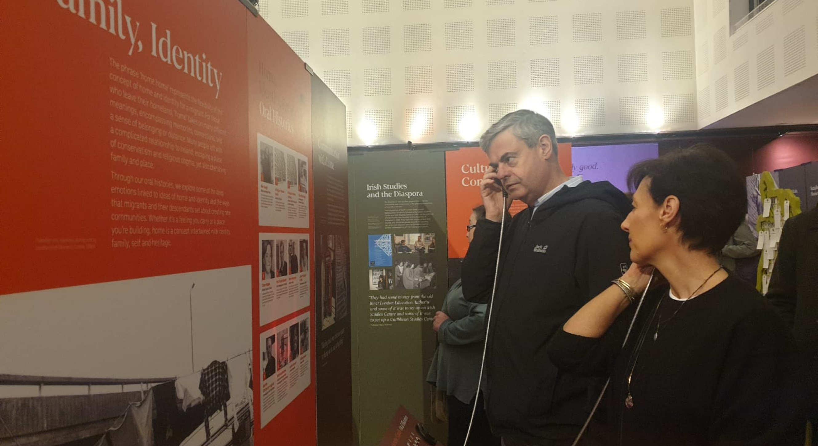 Ambassador Martin Fraser and Deidre Fraser listen to an oral history