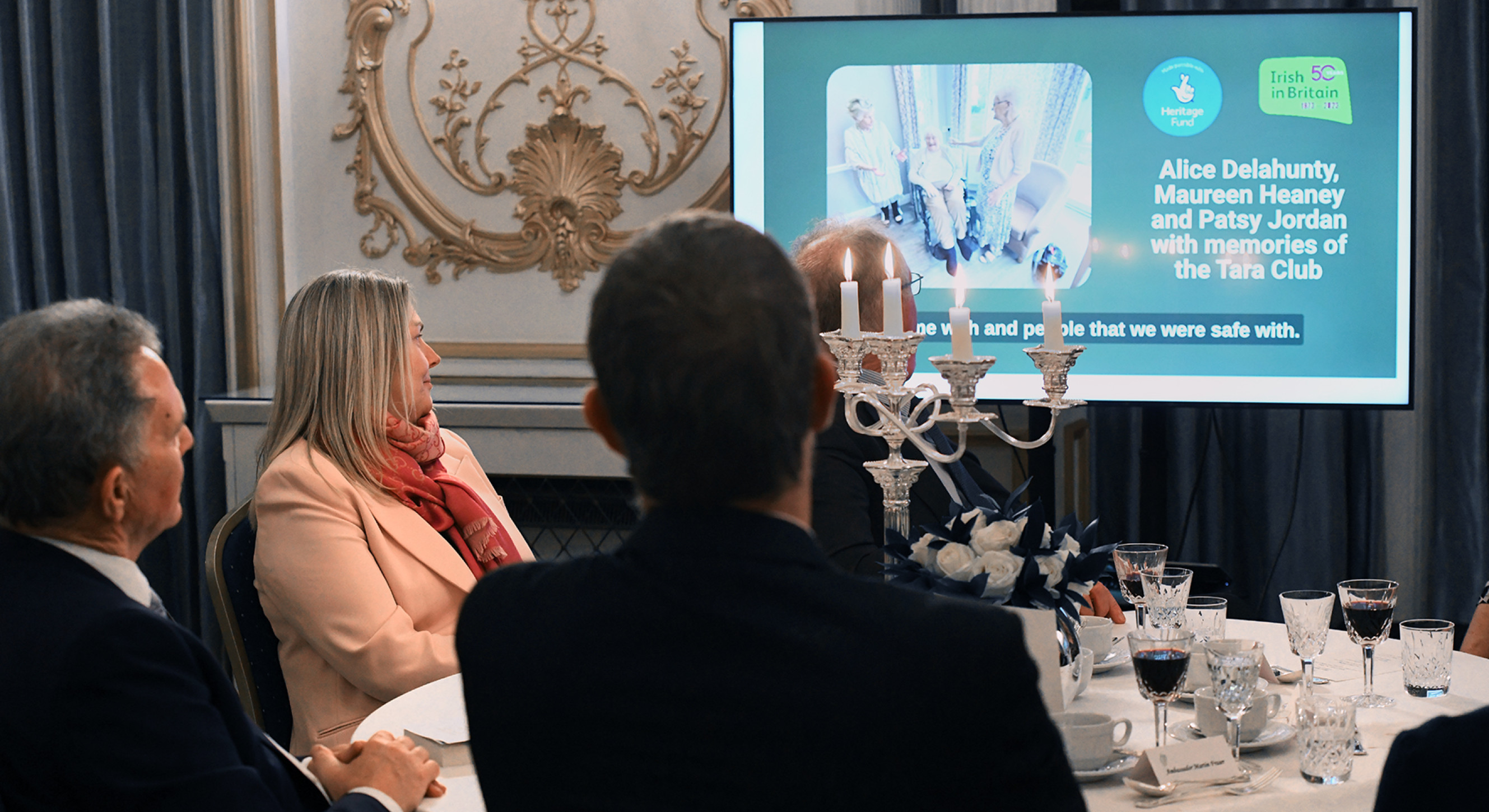 Audience listening to an oral history clip